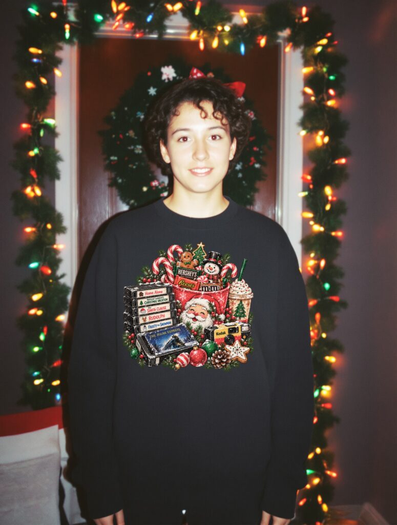 Nostalgic Christmas Movie Night DTF transfer printed on a black sweatshirt, vintage Christmas photo