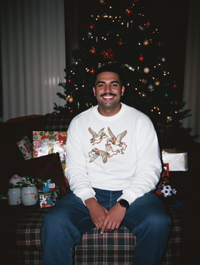 Festive Flying Ducks DTF transfer on a white sweatshirt