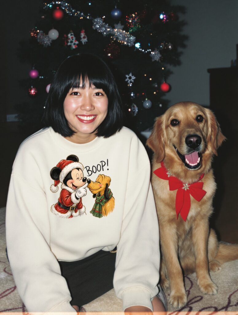 Jolly Santa & Pup Surprise DTF transfer on a cream sweatshirt
